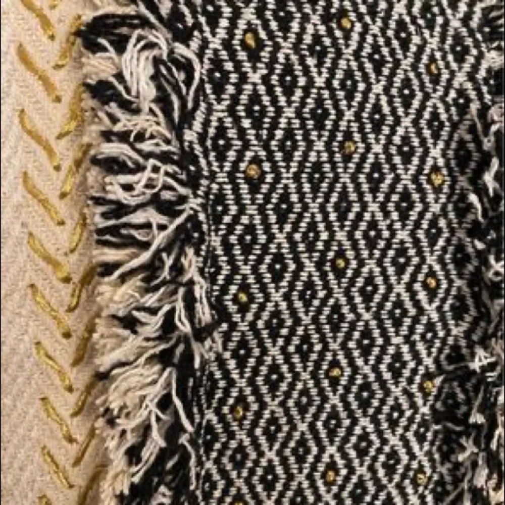 Anthropologie | Tasseled Retrograde Pillow Black Ivory Gold Embroidered